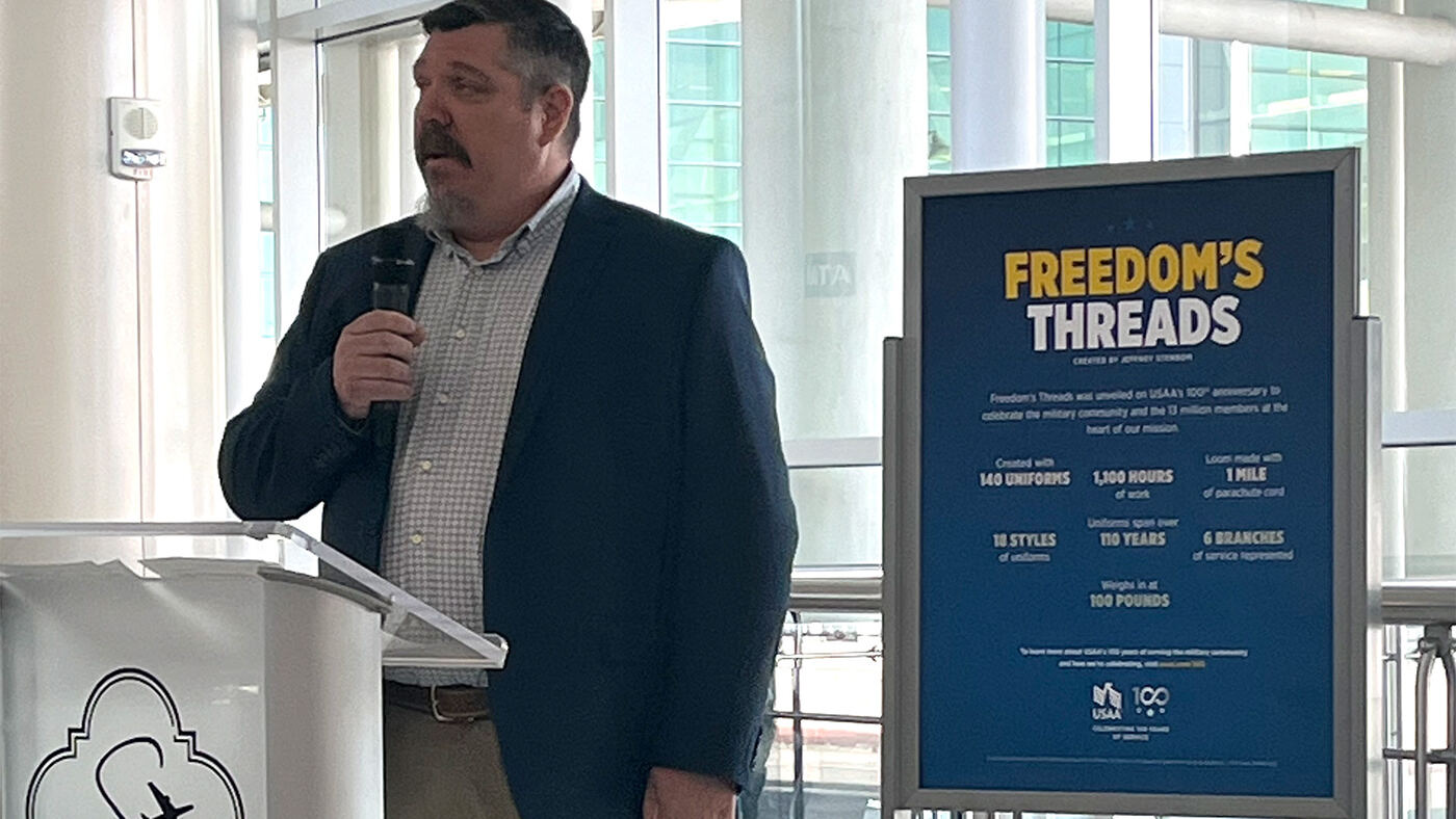 Speaker at the "Freedom's Threads" exhibit